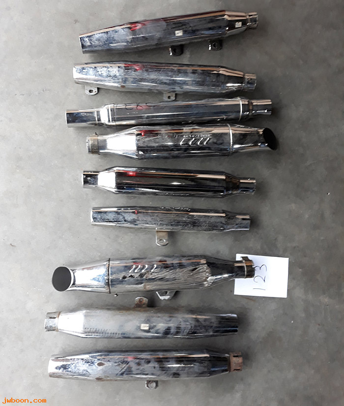 D ZE123 (): 9 mufflers with dents, scratches, rust, holes