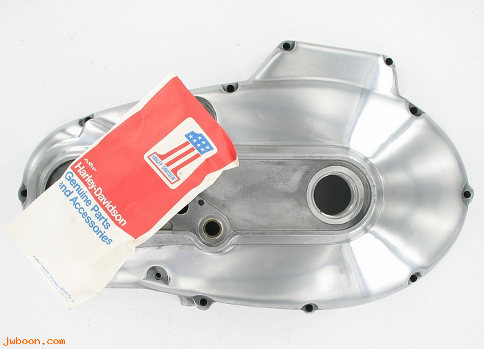  34949-75A (34949-75A): Front chain cover with plugs - NOS -  Sportster XL,XLCH 77-80.AMF