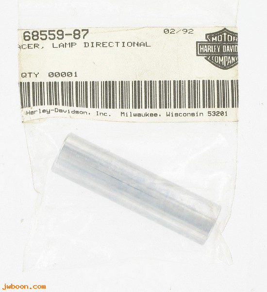   68559-87 (68559-87): Spacer, lamp, directional - NOS - Sportster XL 87-93. FXST 87-90