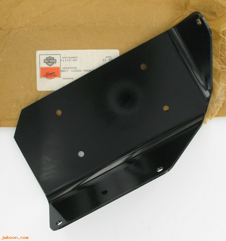   91192-84 (91192-84): Bracket, amplifier mounting - NOS - FLH-80 1984